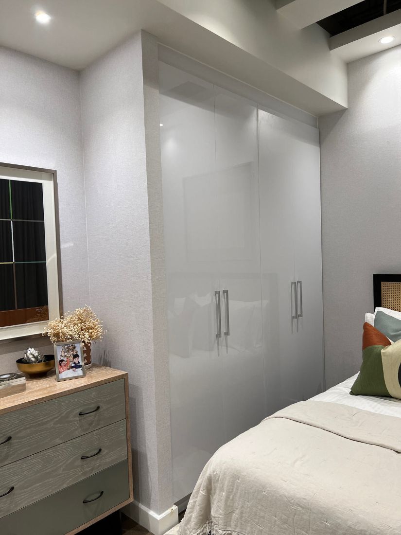 All-white closet, model unit
