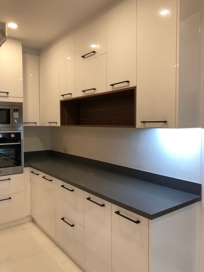 White kitchen with black countertop