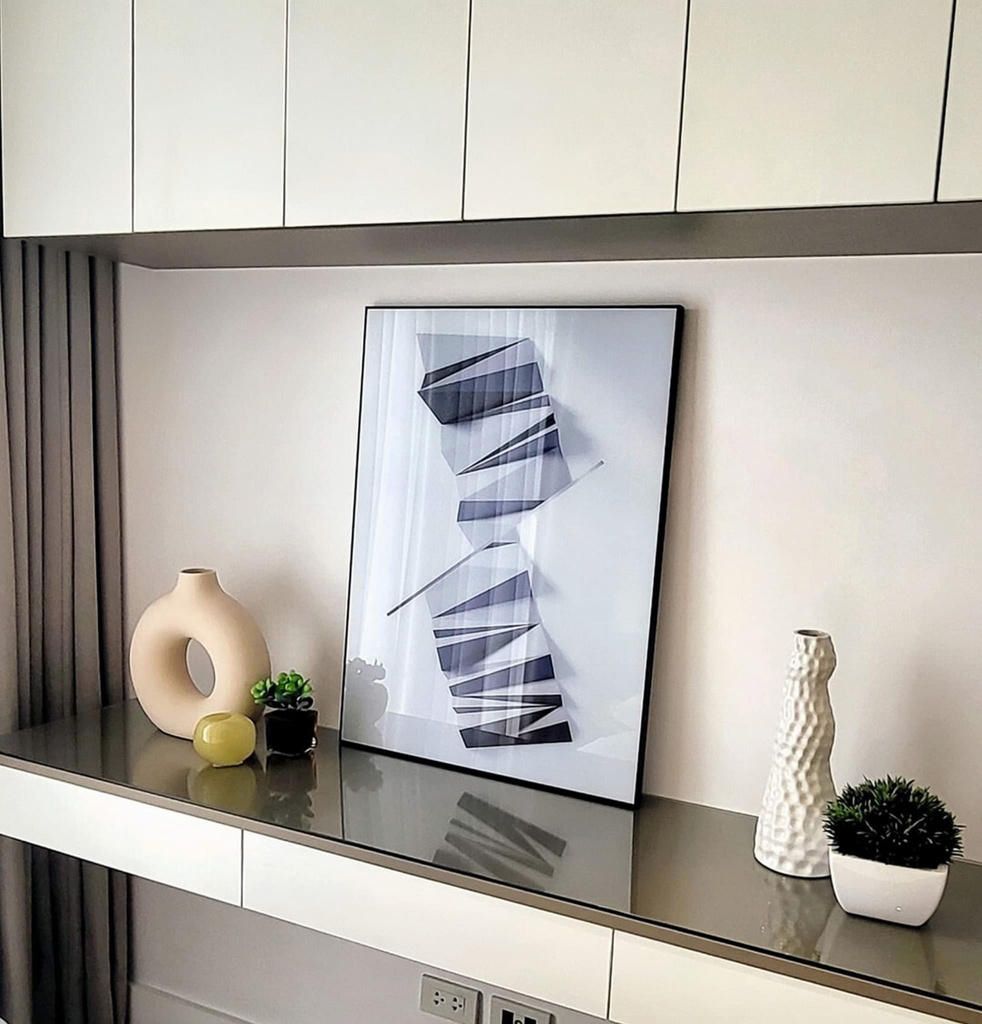 Display cabinet with art